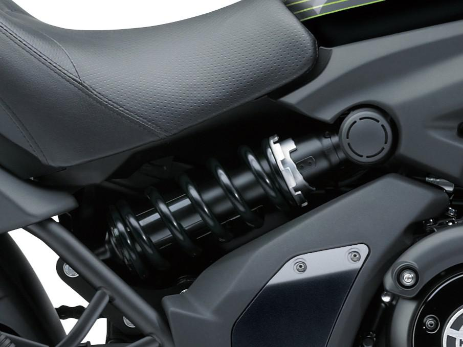 Linkage-equipped offset laydown single-shock